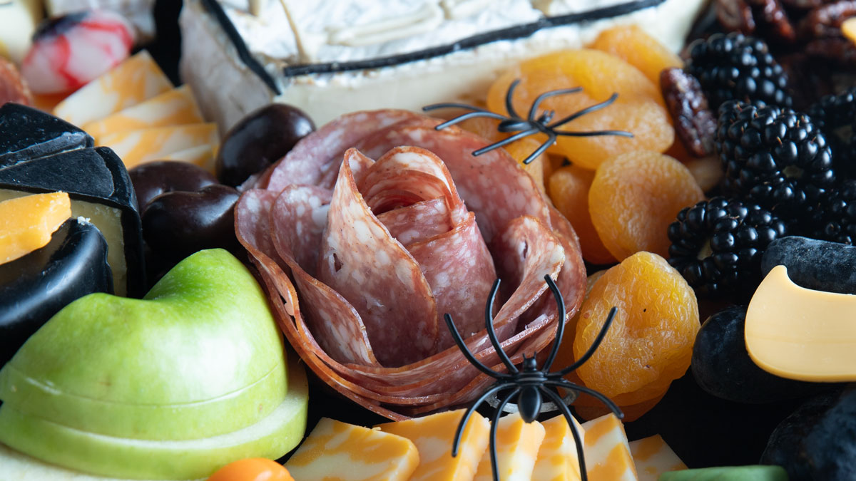 Meat rose on a charcuterie board.