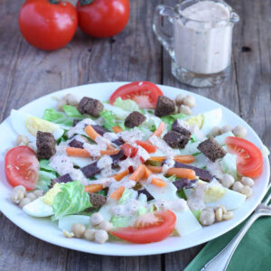 Dinner salad with corned venison, swiss cheese, rye croutons and thousand island dressing.