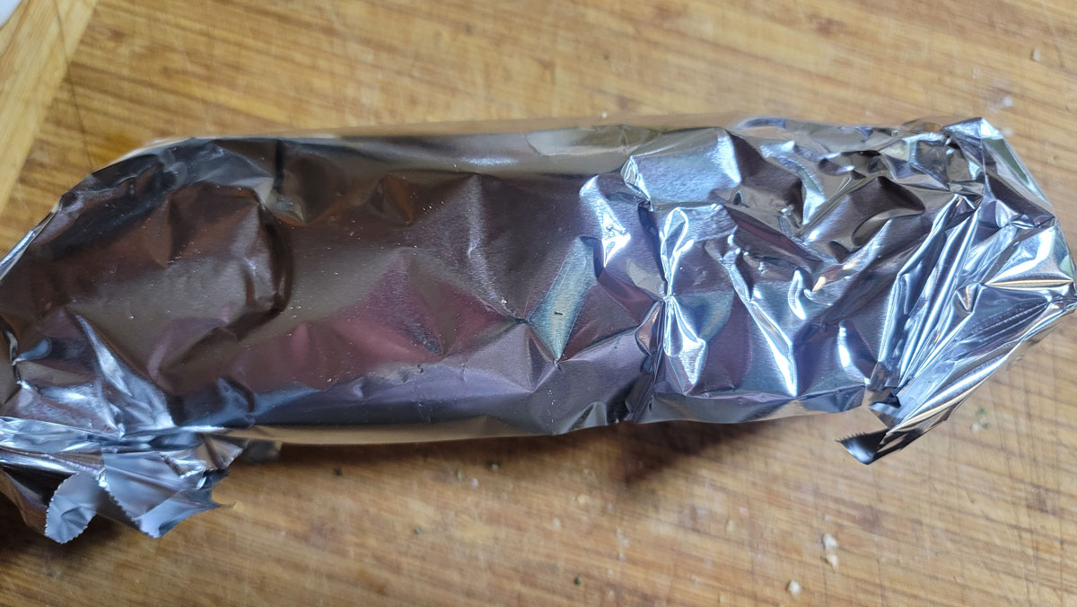 Bread stacked together and wrapped in foil.