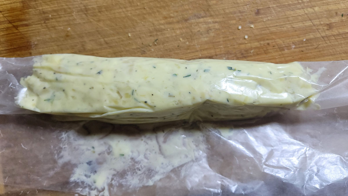 Roll the waxed paper on a counter to round out the edges and form a log.