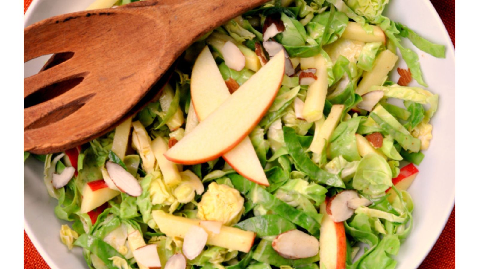 Brussels sprouts salad with sliced apples.