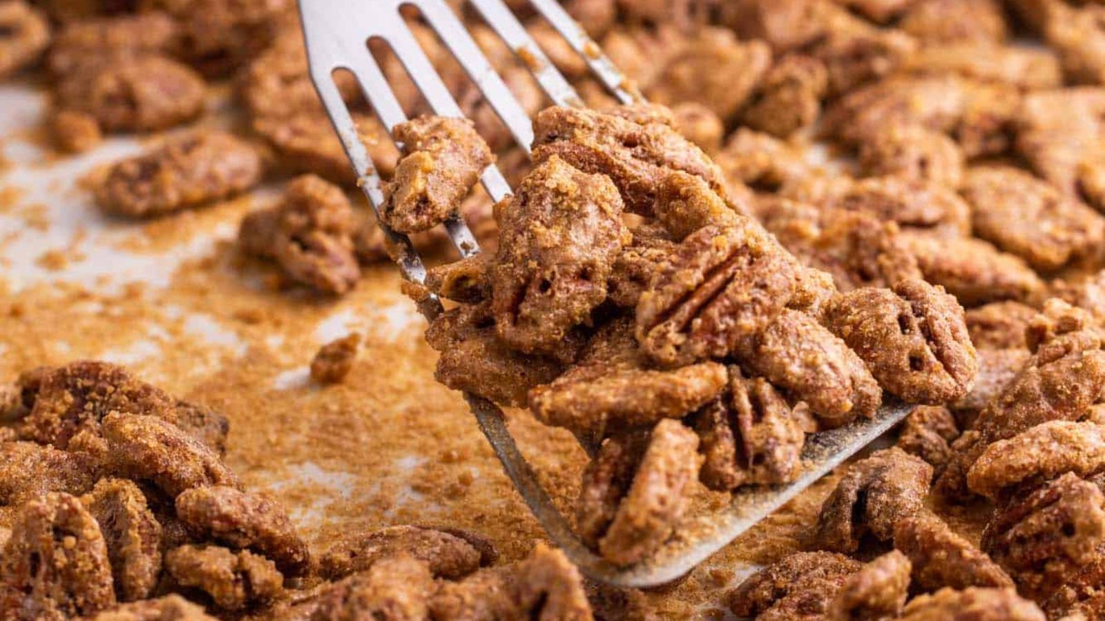 A ladle of brittle pecans.