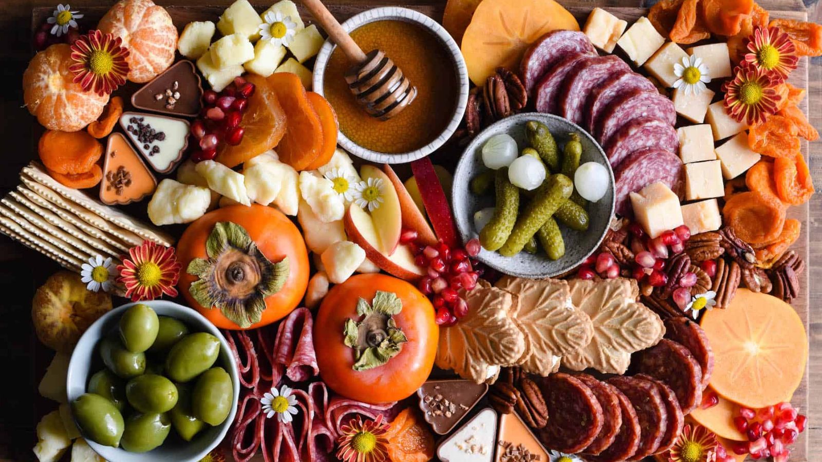 Charcuterie board with honey.