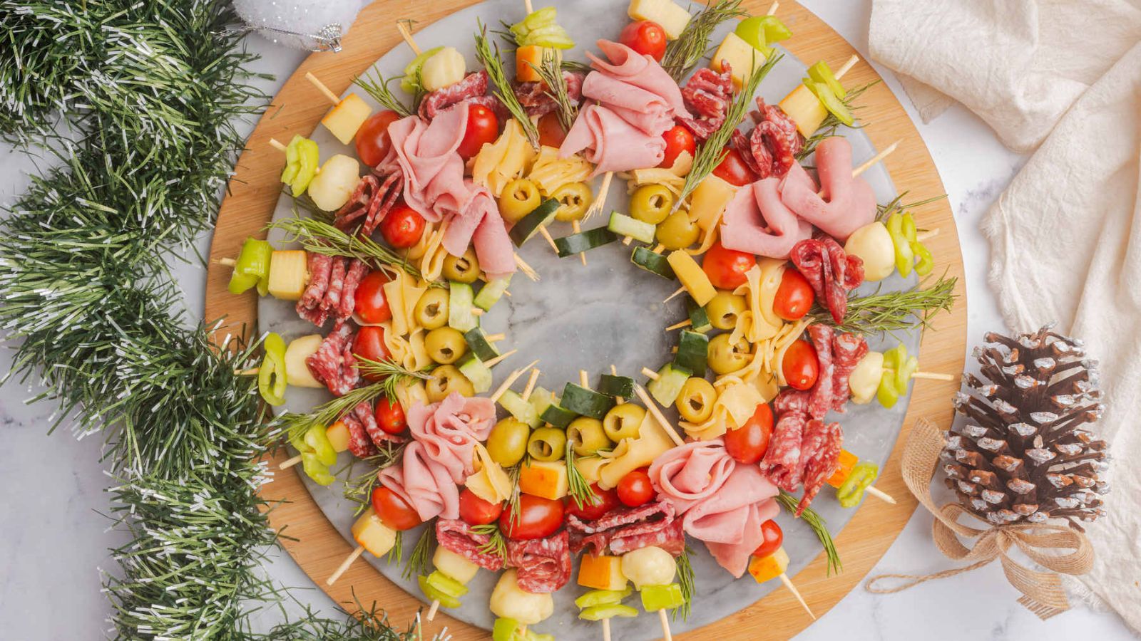 Charcuterie wreath on a  wooden board.