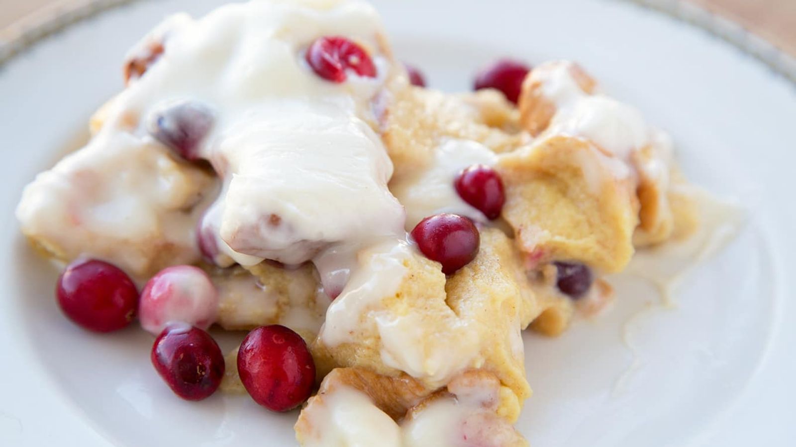 Eggnog bread pudding with cranberries.