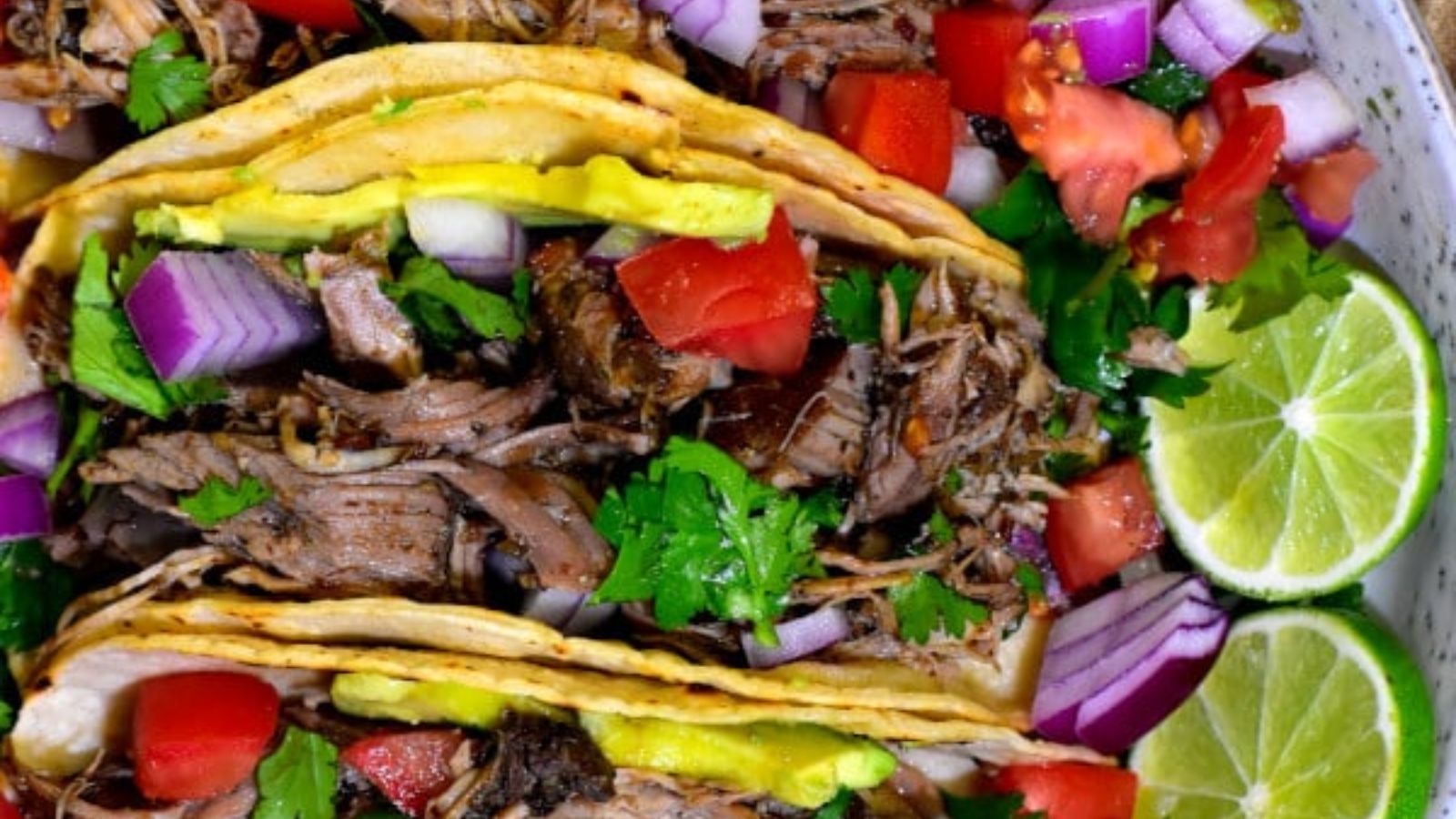 Barbacoa pork in tacos.