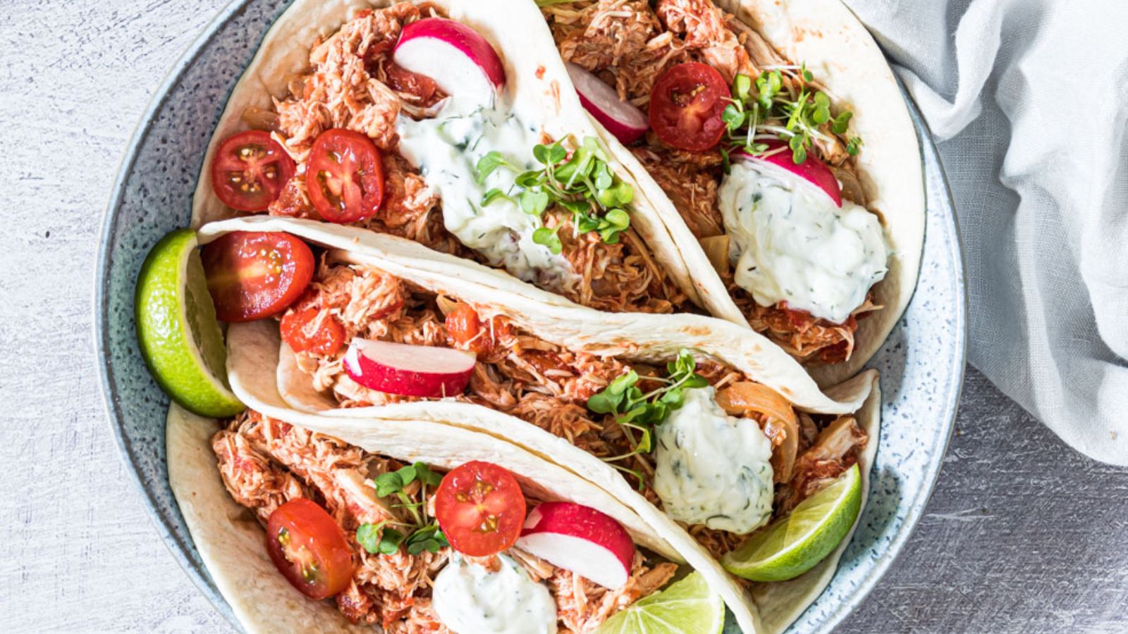Chicken fajitas on a plate.