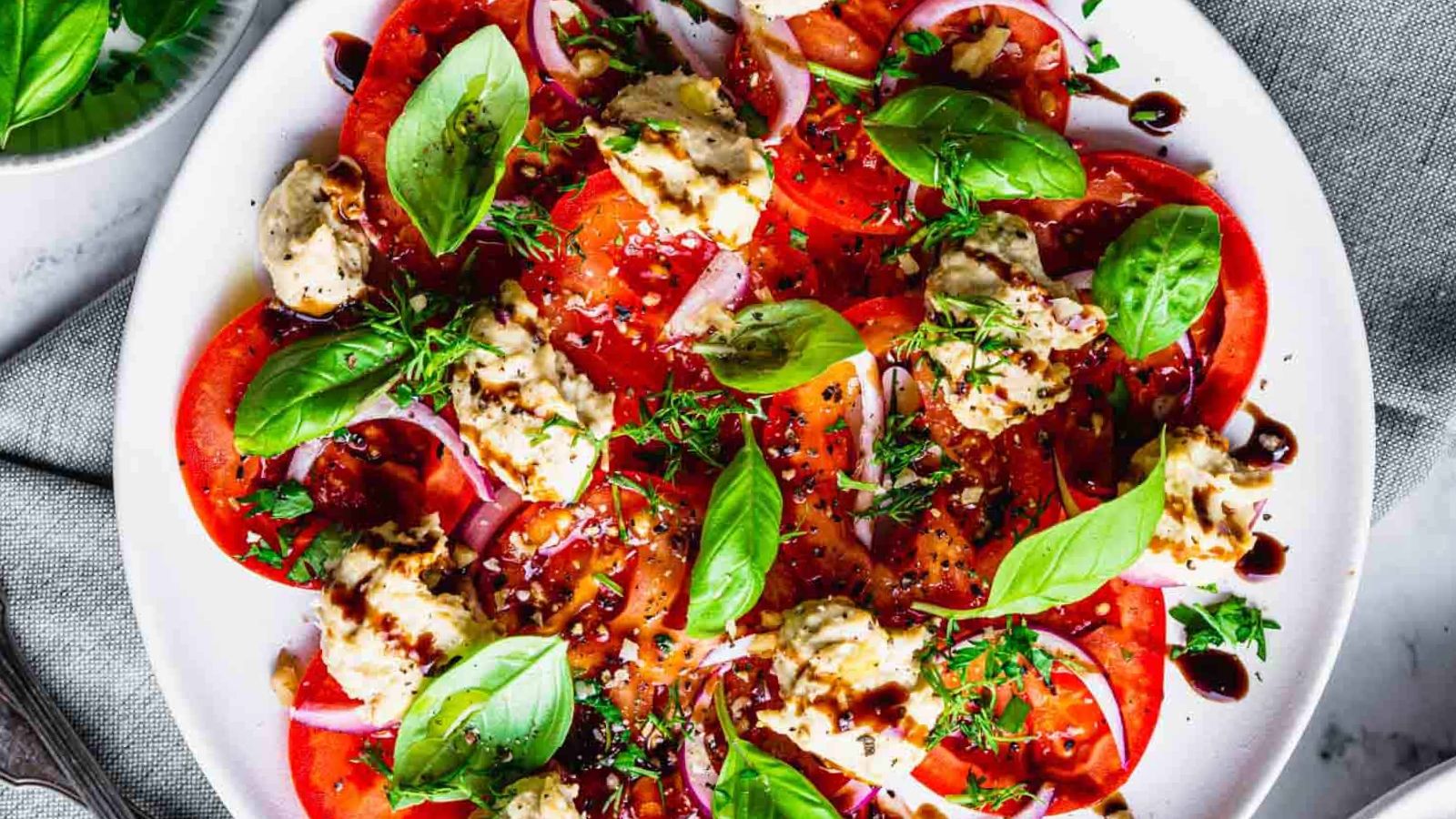 Tomato carpaccio on a plate.