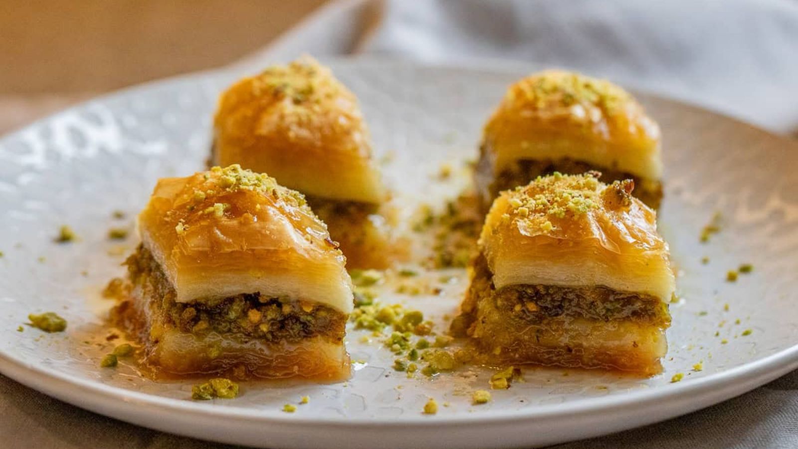 Pistachio baklava on a plate.