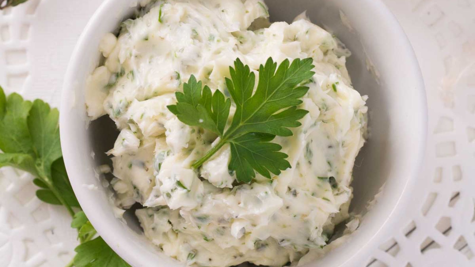 Garlic herb butter in a bowl.