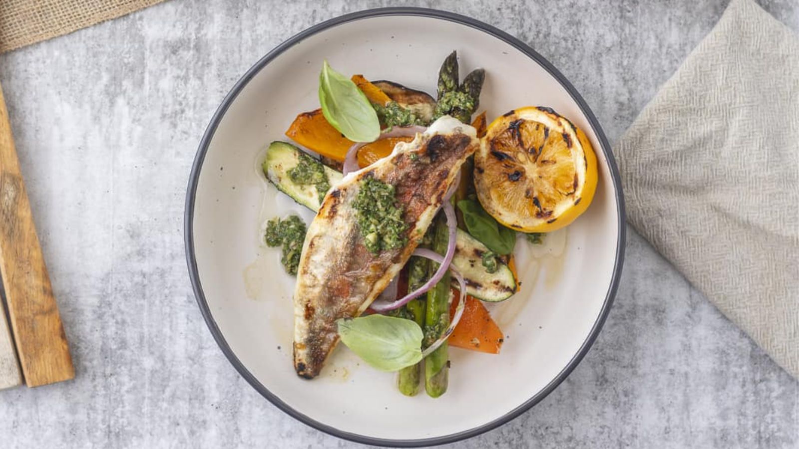 Grilled gurnard on a plate.
