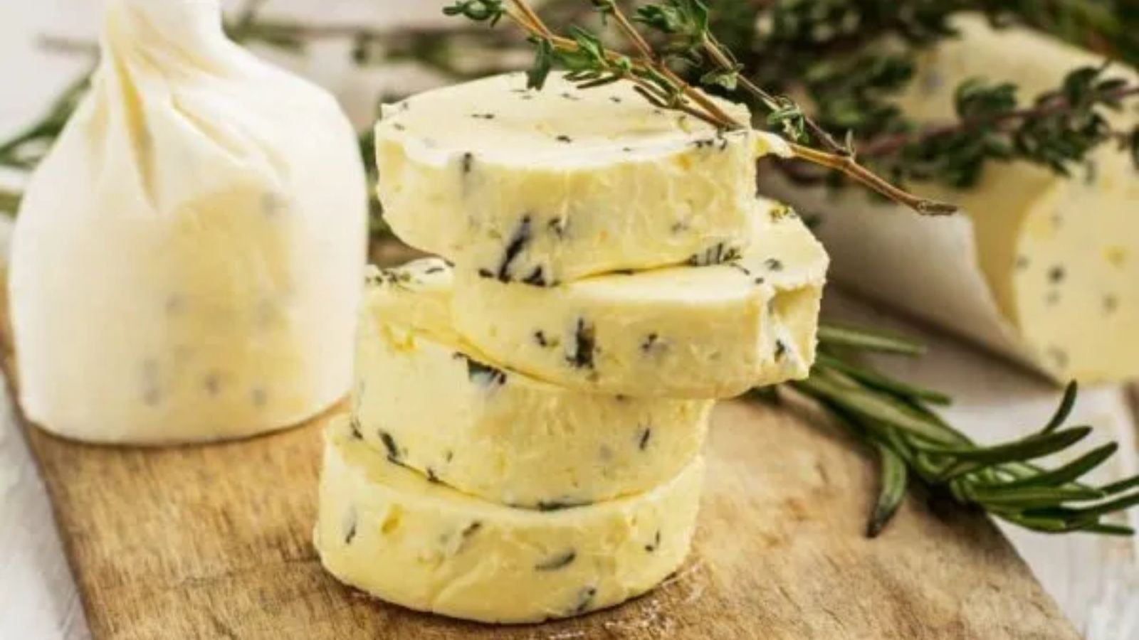 Herb butter rub on a wooden board.