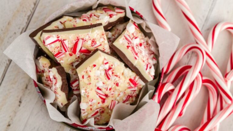 Peppermint bark with candy canes on the side.