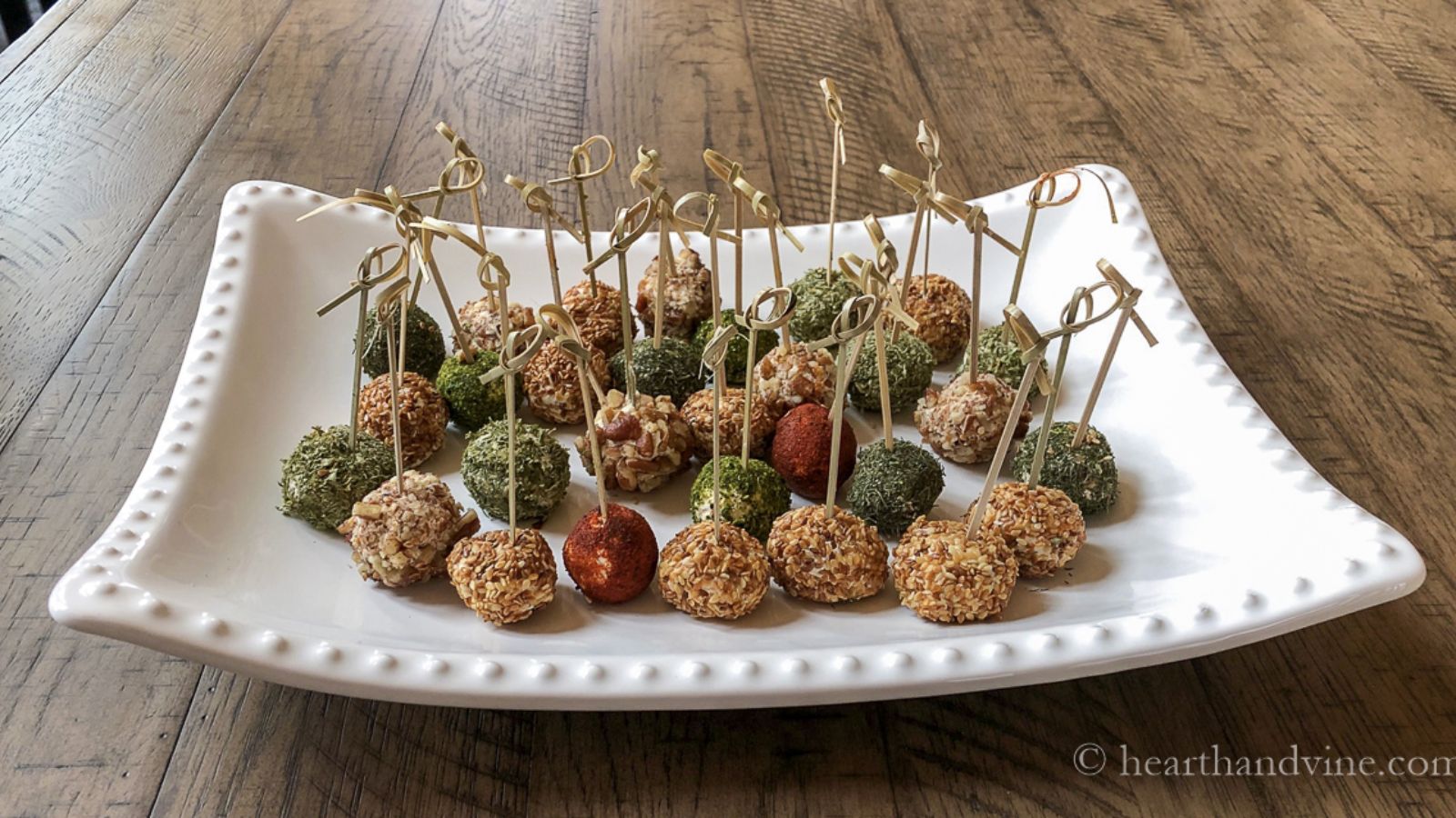 Cheeseball bites on a plate.