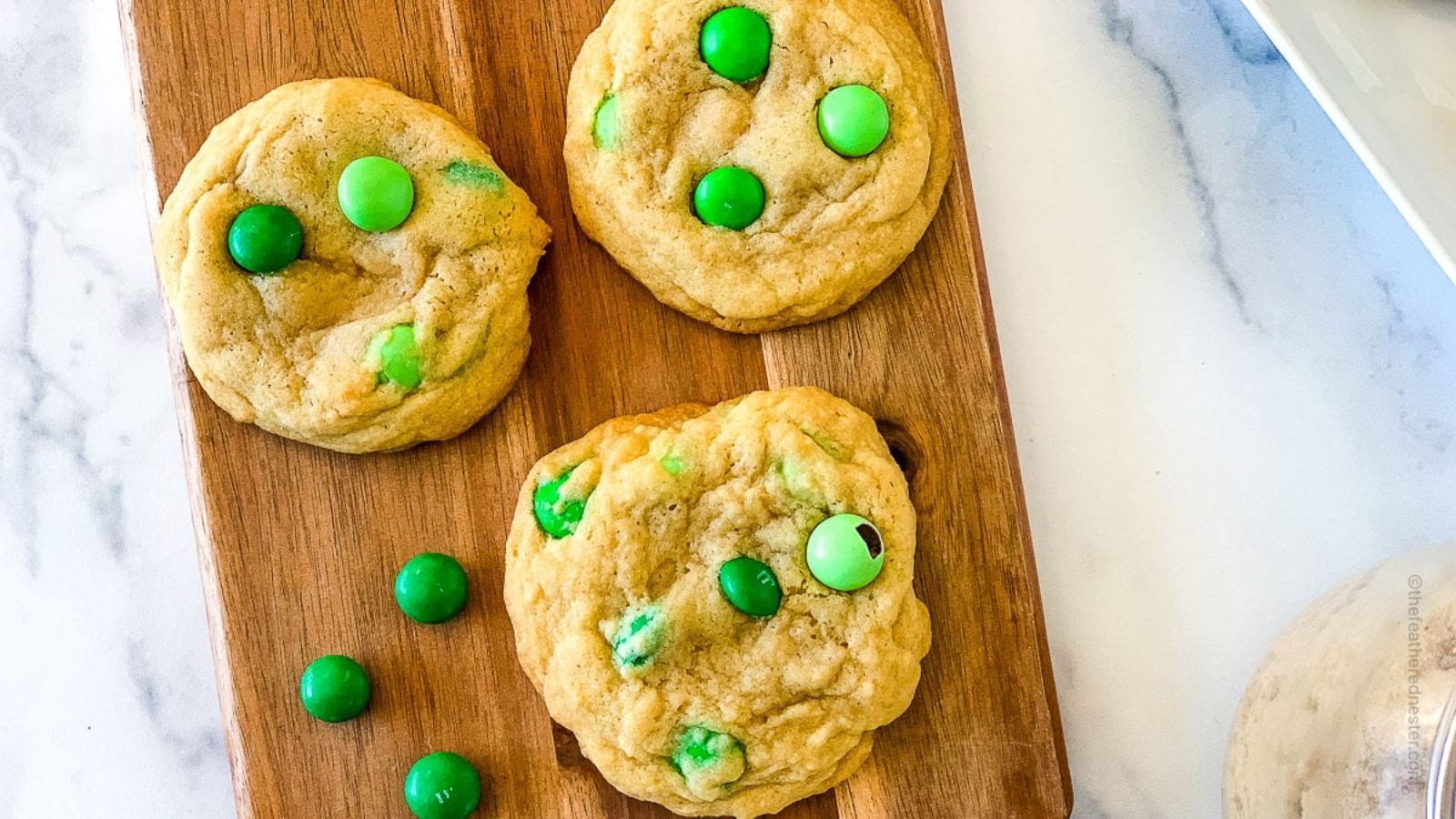 Mint cookies on a wooden board.