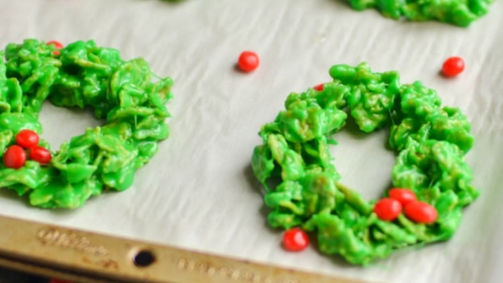 Christmas wreath cookies on a tray.