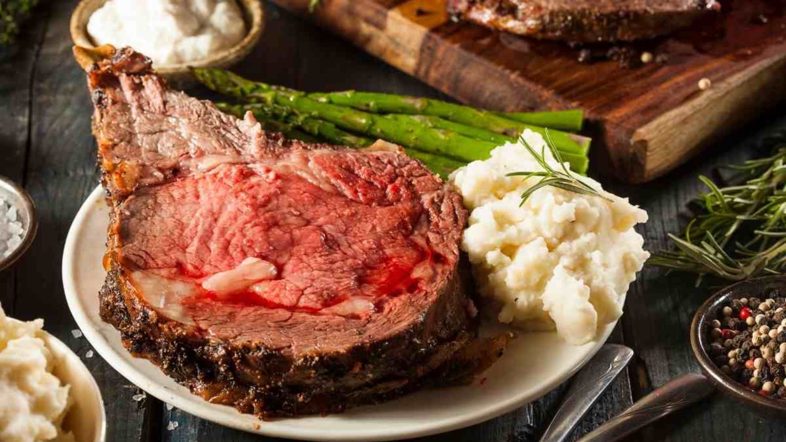 Prime rib roast on a plate.