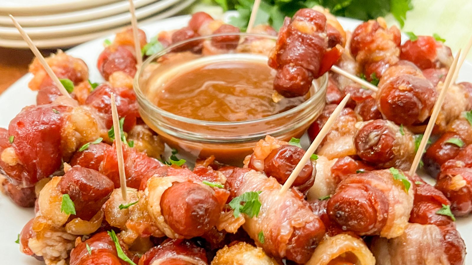 Bacon wrapped smokies with dip.
