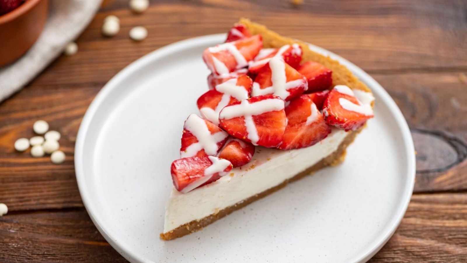 Slice of strawberry pie on a plate.