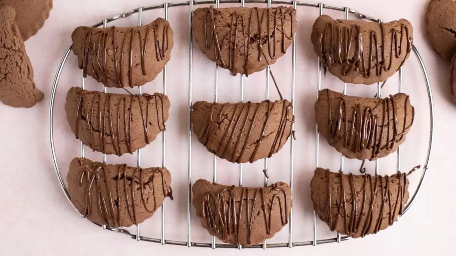 Sweet empanadas with chocolate drizzle.