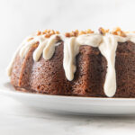 Butternut squash cake with dripped cream cheese glaze.
