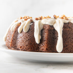 Butternut squash cake with dripped cream cheese glaze.