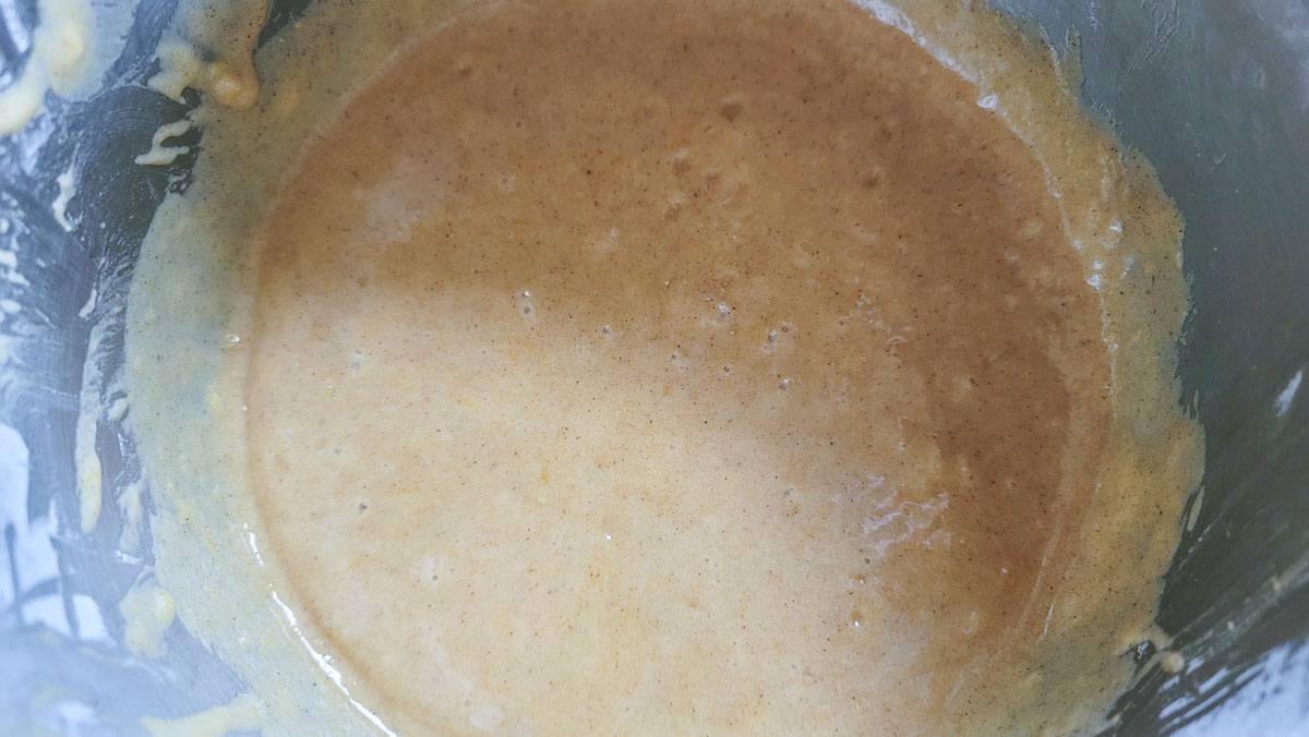 Cake dough in a bowl after mixing.