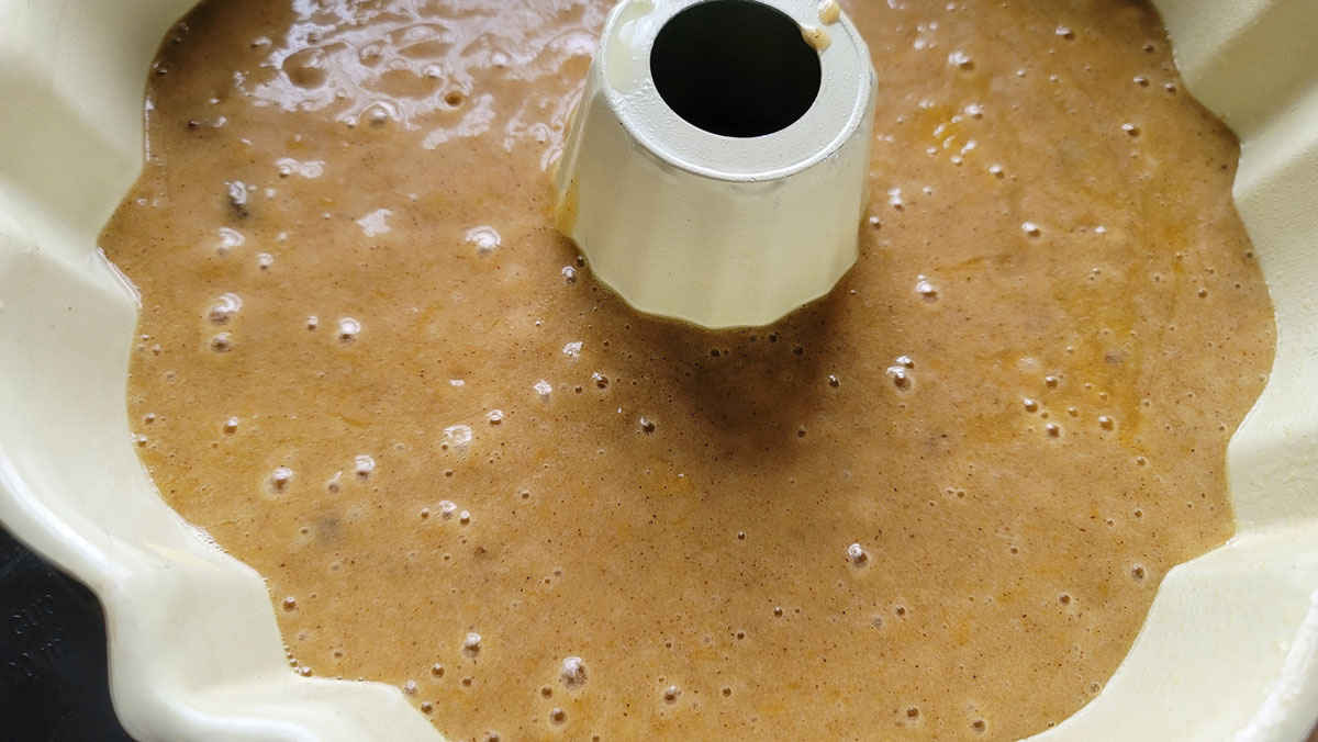 Cake dough in bundt cake pan.