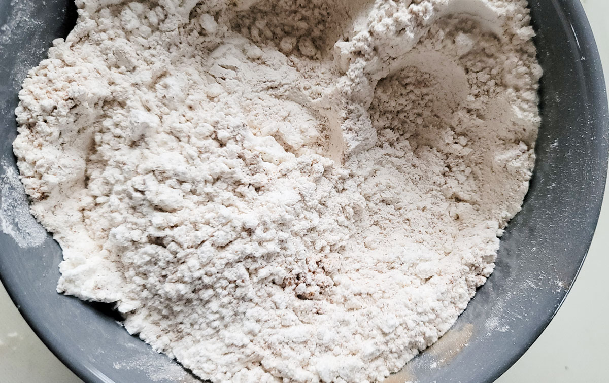 Dry ingredients mixed thoroughly in the bowl.