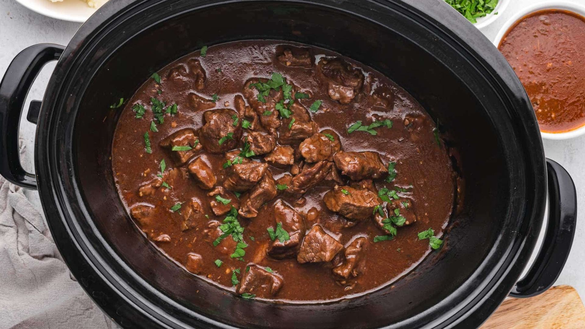 Crockpot with beef tips and gravy.