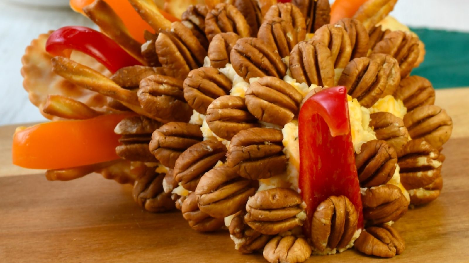 turkey cheeseball on a wooden board.