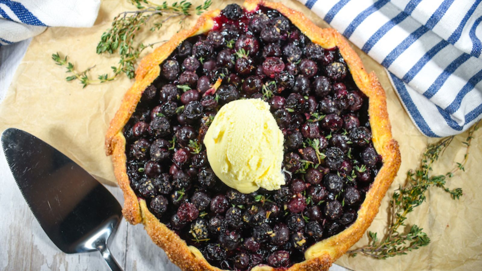 Blueberry galette with ice cream.