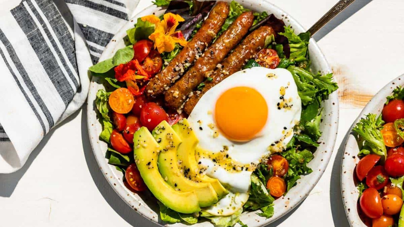 Breakfast salad with egg.