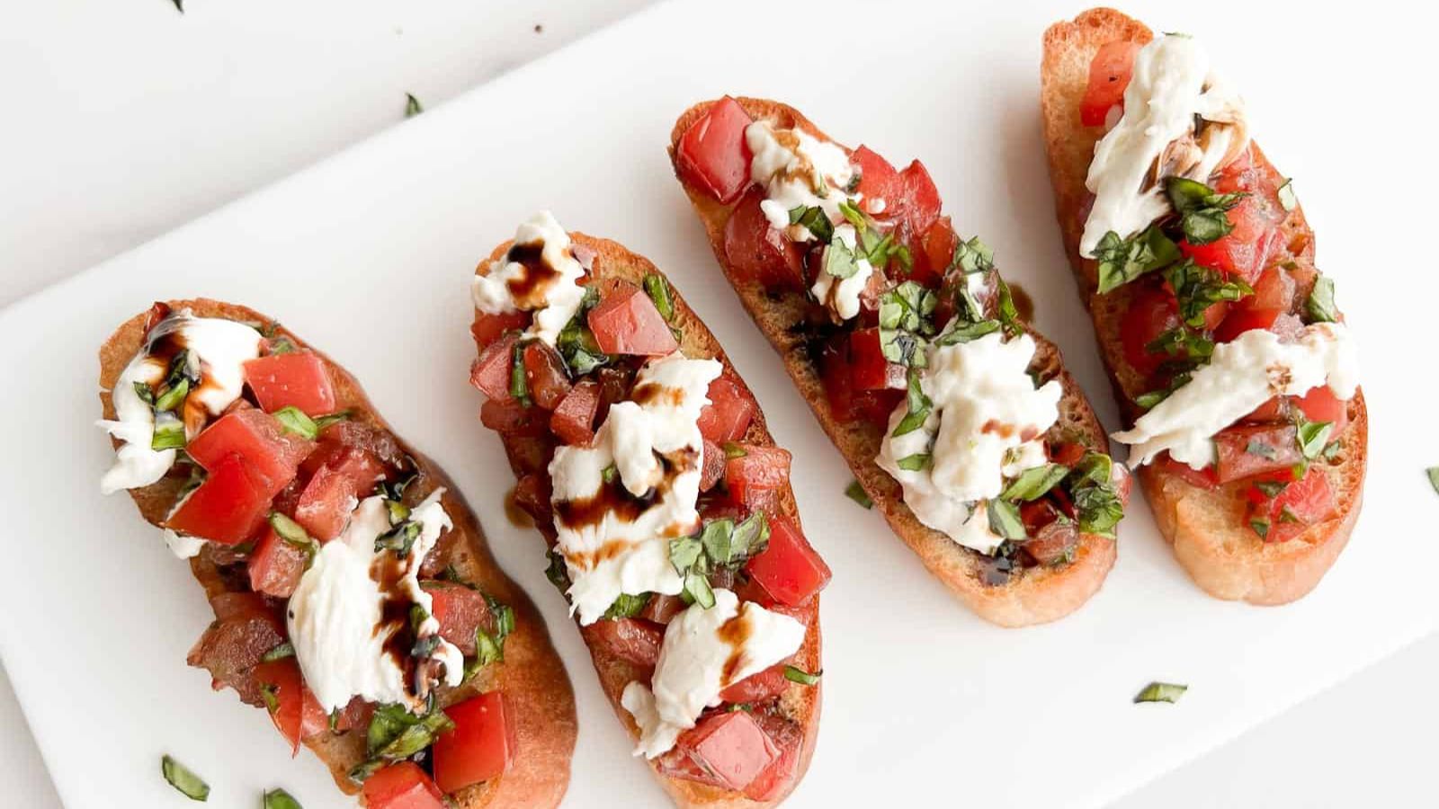 Burrata bruschetta on a plate.