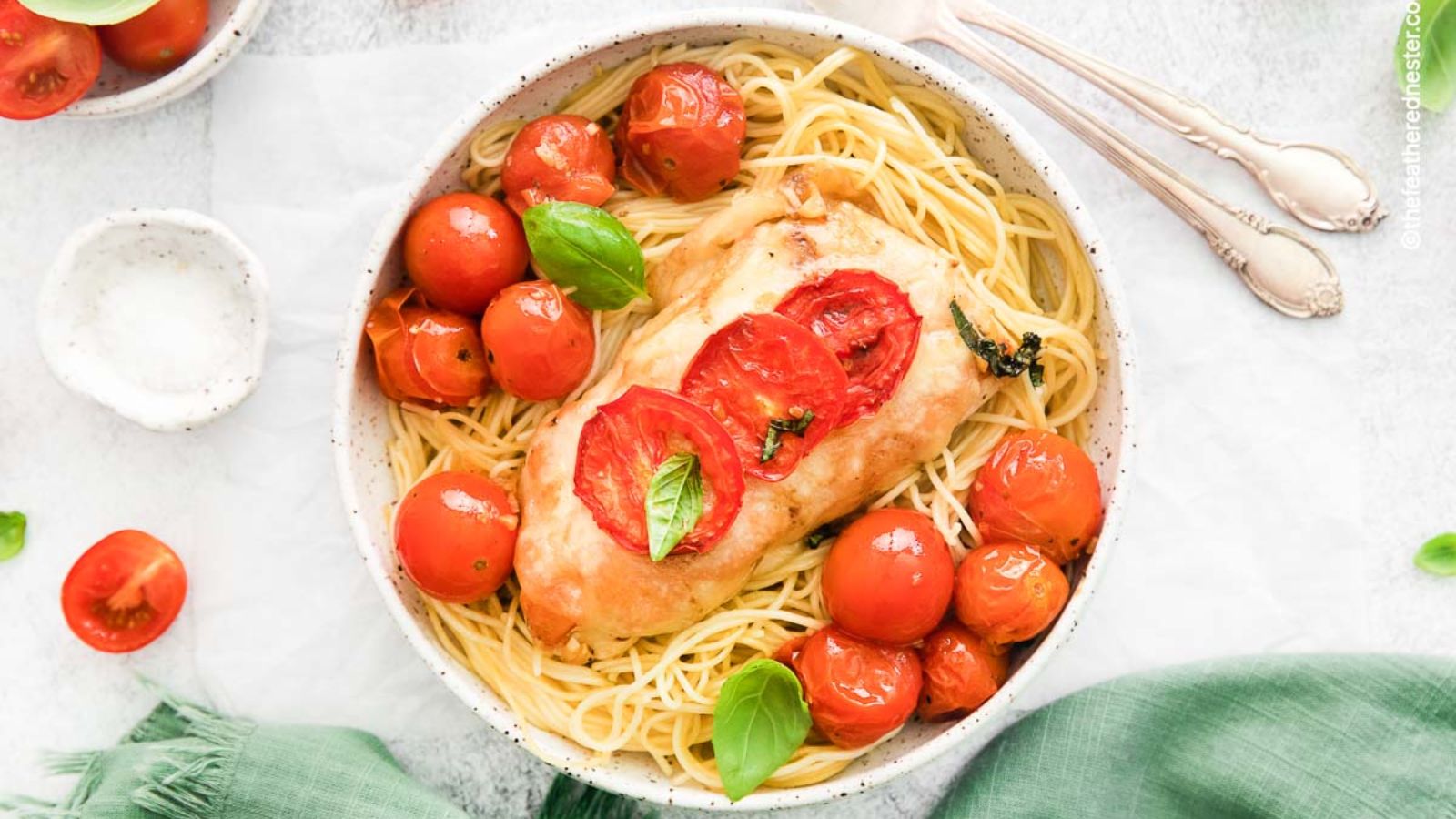 Pasta with chicken and tomatoes.
