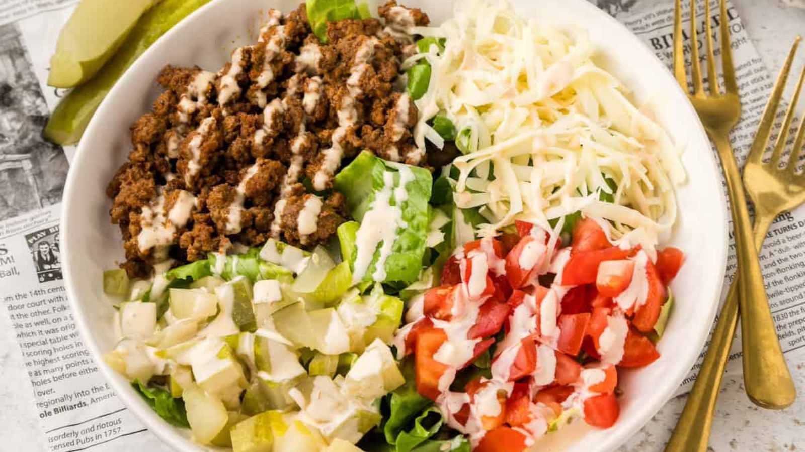 Cheeseburger salad on a plate.