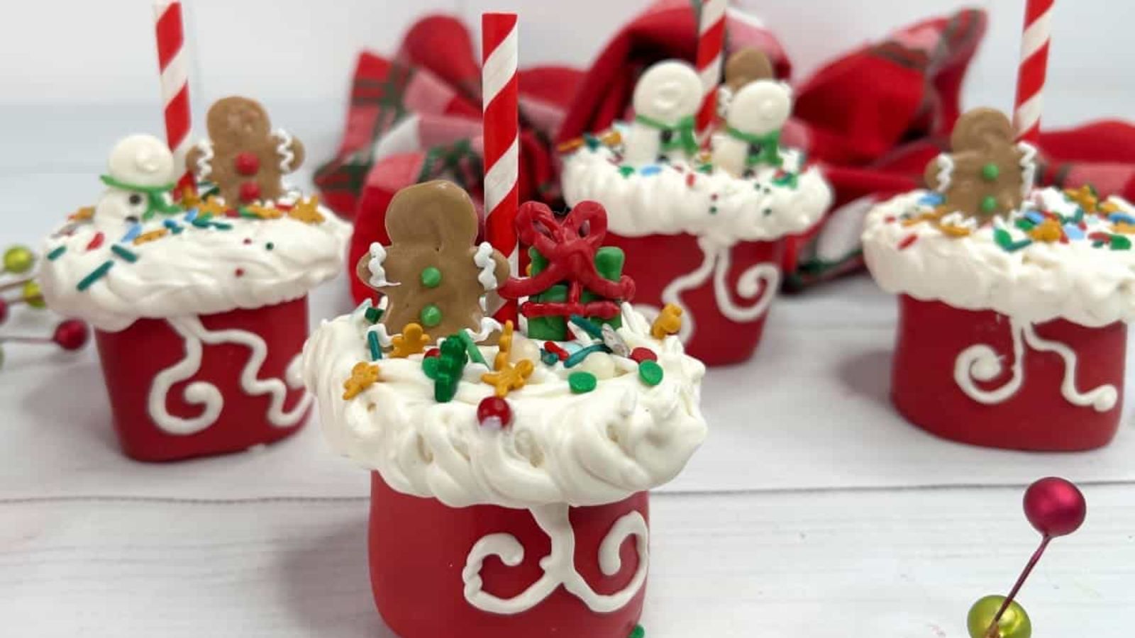 Marshmallow pops in Christmas theme.