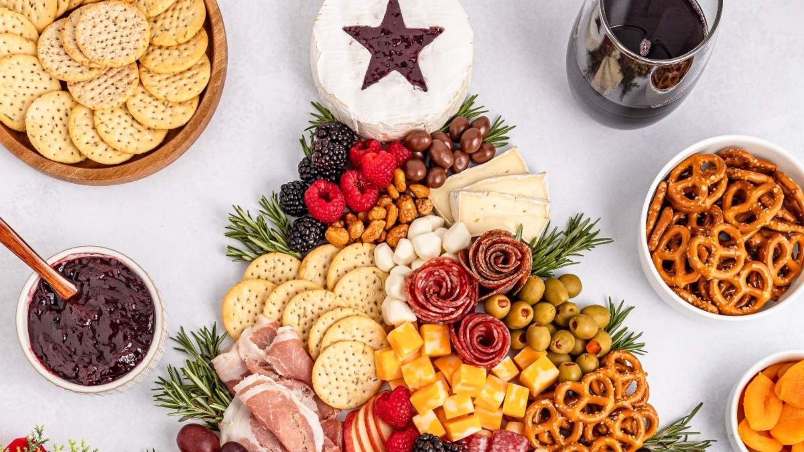 Charcuterie board with sauce on the side.