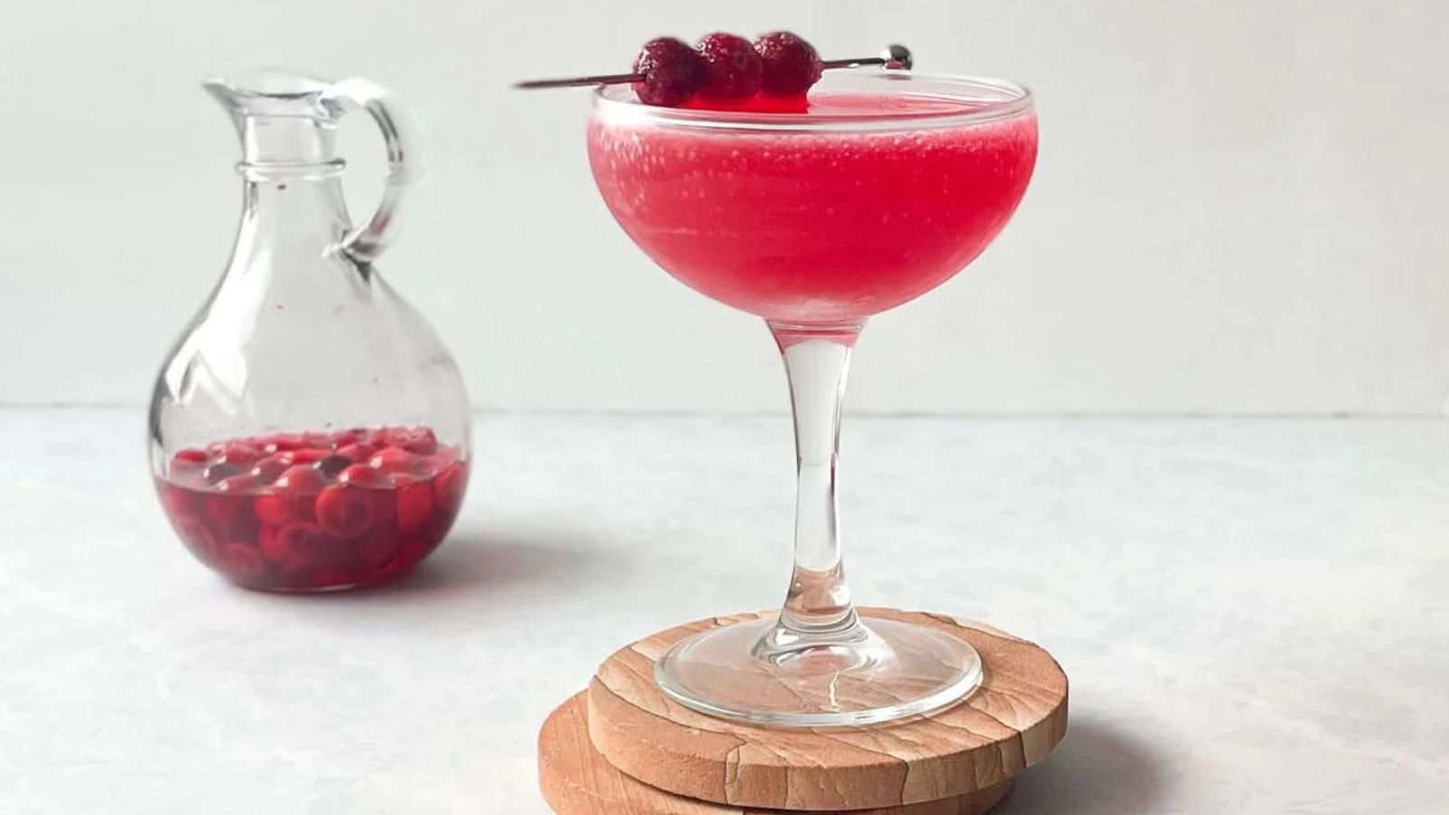 Cranberry gimlet in a cocktail glass.