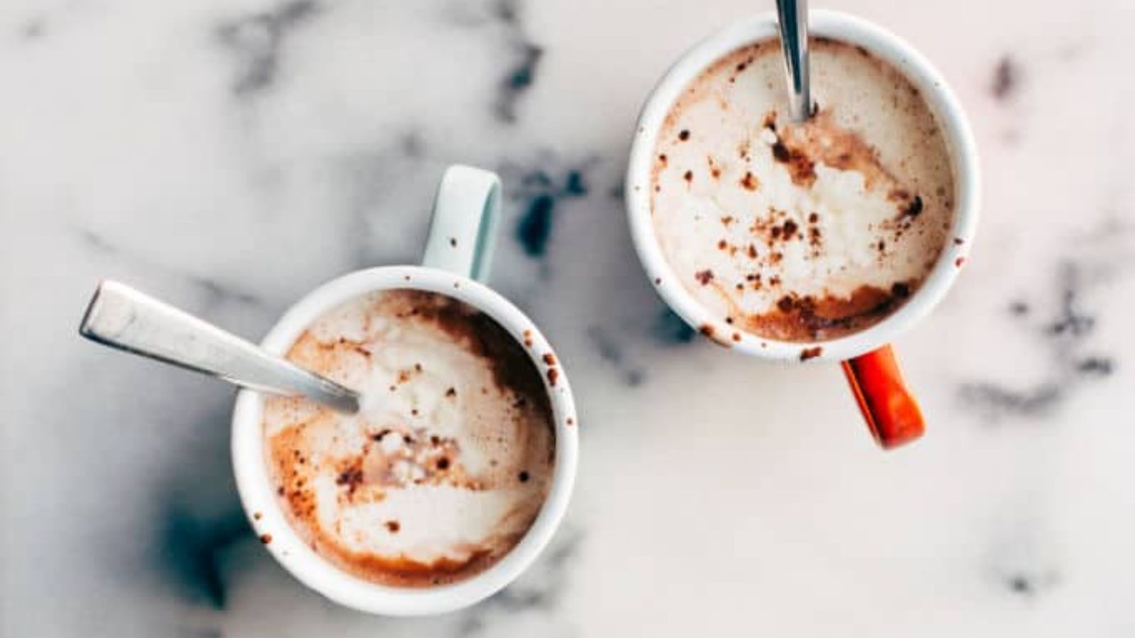 Two cups of hot chocolate.