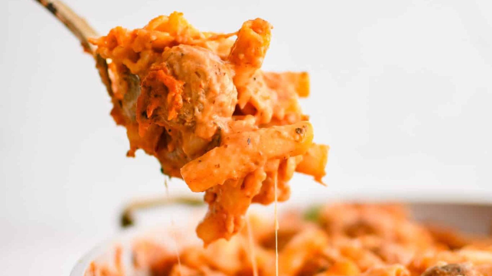 A spoonful of meatball casserole.