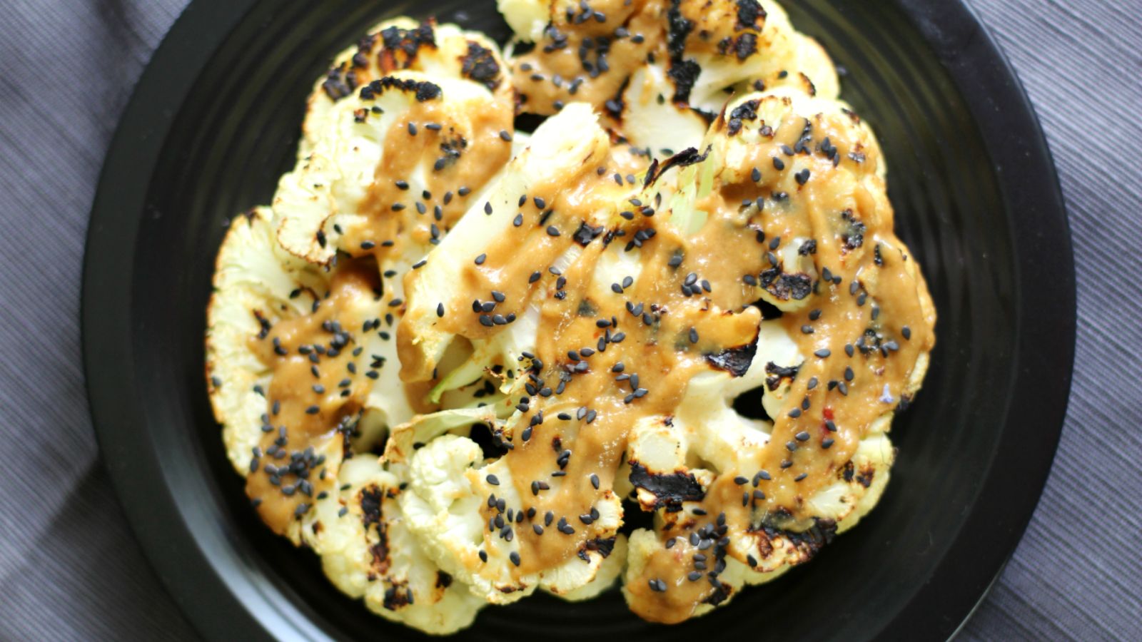 Cauliflower steaks with sauce.