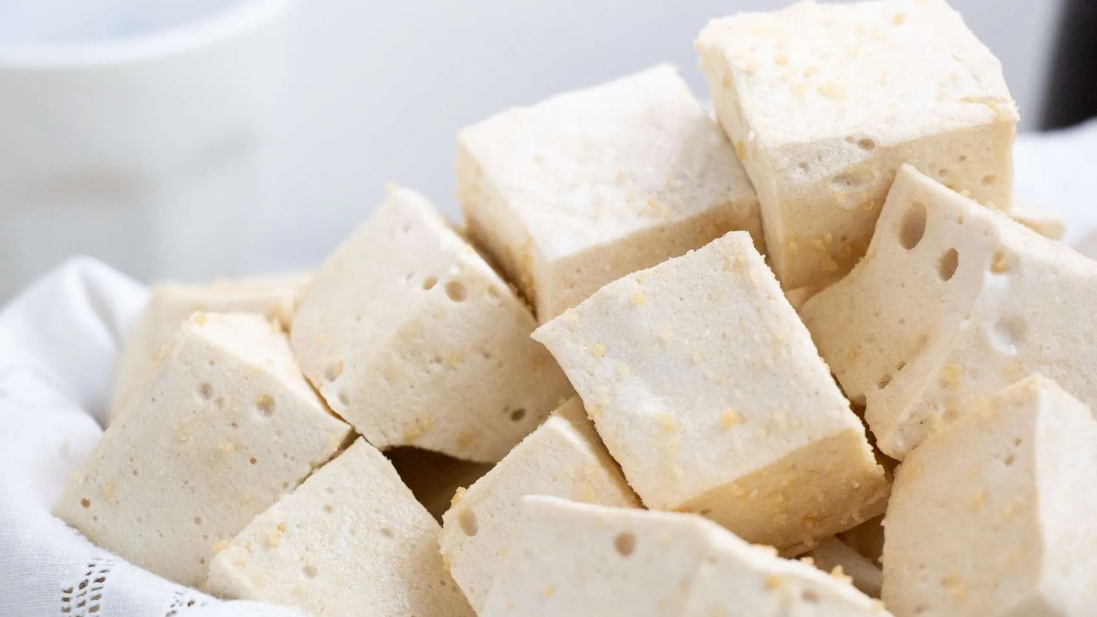 Marshmallow cubes on a white background.