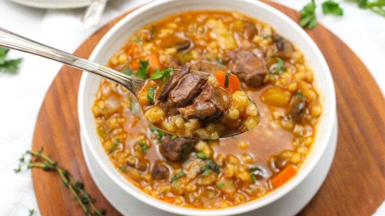 Beef and barley soup close up.