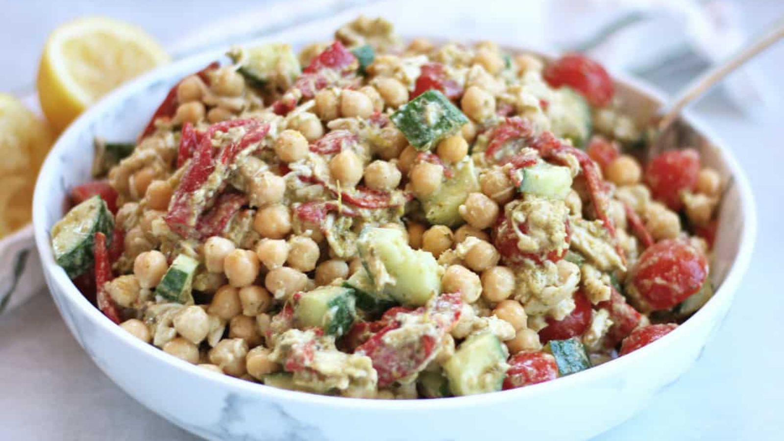 Pesto and chickpea salad with lemon.
