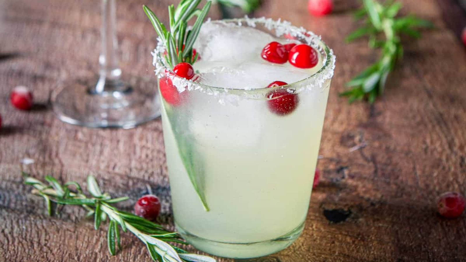 Margarita with cranberries in a glass.
