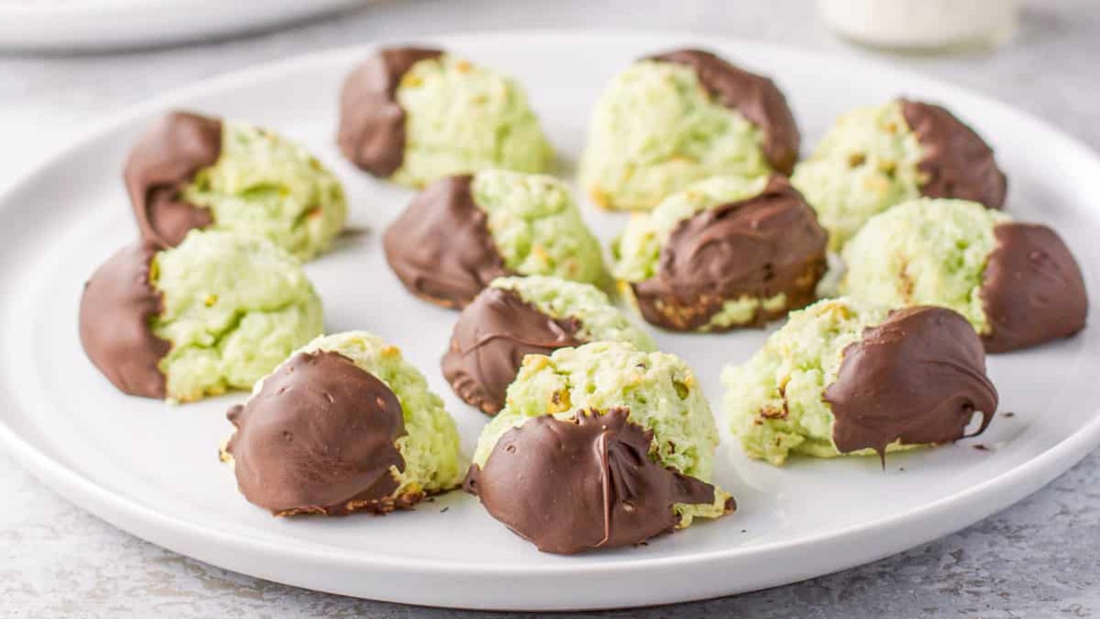 Pistachio cookies on a plate.