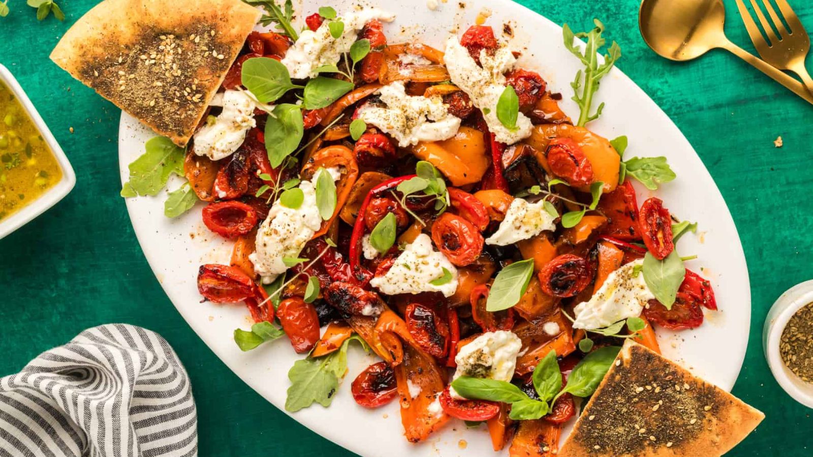 Salad with bell pepper and chips on a plate.