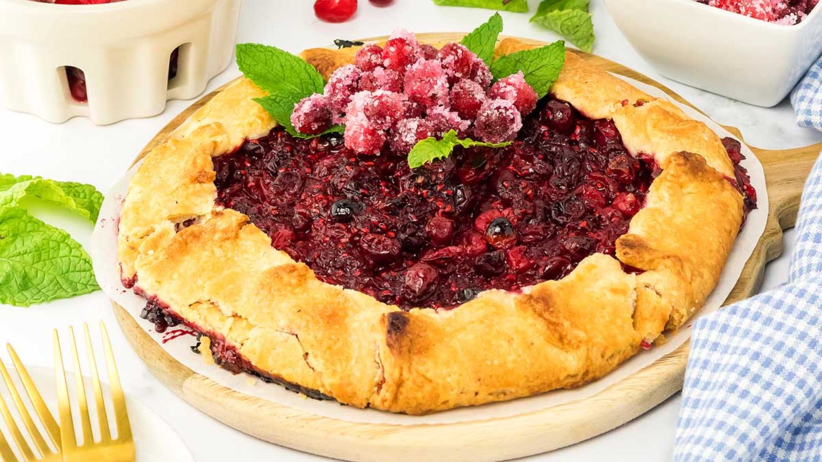 Cranberry galette on a wooden board.