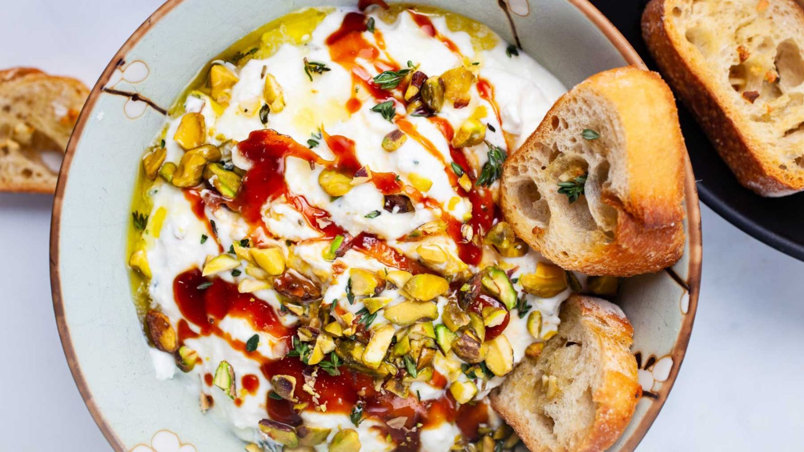 Ricotta with honey in a bowl.